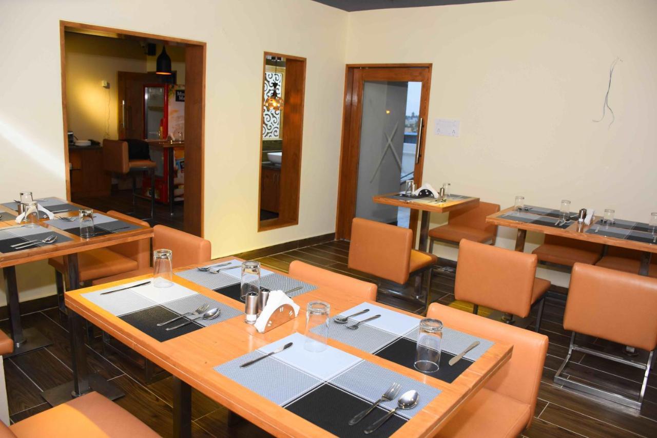 Hotel Sai Krish Grand Chettippattu Buitenkant foto